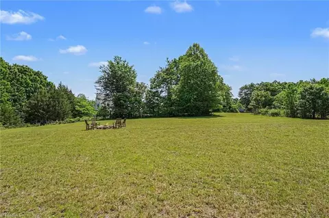 Exterior - 8124 Harrell Rd E, Oak Ridge, NC 27310 photo 8 of 10