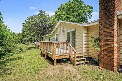 Exterior - 8124 Harrell Rd E, Oak Ridge, NC 27310 photo 6 of 10