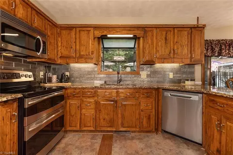 Kitchen - 1335 Shingle Gap Rd, Purlear, NC 28665 photo 4 of 6