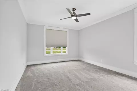 Bedroom - 8403 Wolf Ridge Trl, Oak Ridge, NC 27310 photo 6 of 10