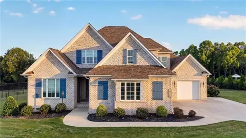 Exterior - 8403 Wolf Ridge Trl, Oak Ridge, NC 27310 photo 2 of 7