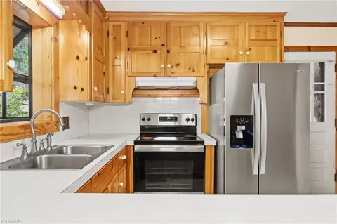 Kitchen - 306 Spring St, King, NC 27021 photo 2 of 3