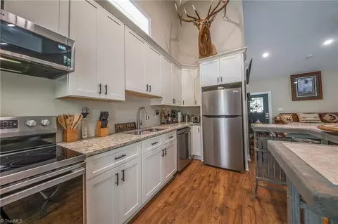 Kitchen - 1325 Doyle Cromer Rd, King, NC 27021 photo 3 of 4