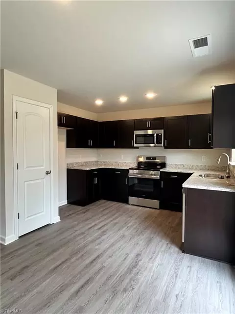 Kitchen - 403 Unity St, Thomasville, NC 27360 photo 3 of 4