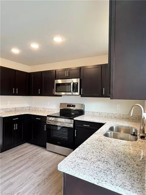 Kitchen - 403 Unity St, Thomasville, NC 27360 photo 2 of 4