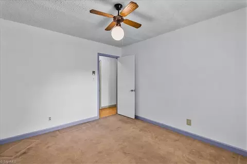 Bedroom - 8203 Harrell Rd E, Oak Ridge, NC 27310 photo 5 of 9