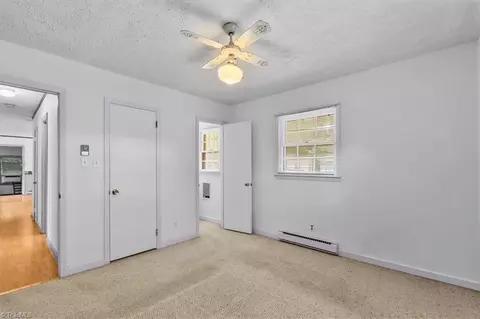 Bedroom - 8203 Harrell Rd E, Oak Ridge, NC 27310 photo 2 of 9