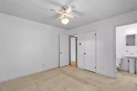 Bedroom - 8203 Harrell Rd E, Oak Ridge, NC 27310 photo 3 of 9