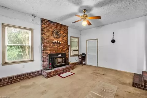 Living - 8203 Harrell Rd E, Oak Ridge, NC 27310 photo 1 of 9
