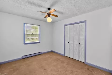 Bedroom - 8203 Harrell Rd E, Oak Ridge, NC 27310 photo 4 of 9