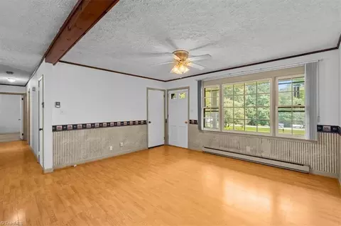 Living - 8203 Harrell Rd E, Oak Ridge, NC 27310 photo 4 of 9