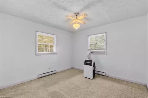 Bedroom - 8203 Harrell Rd E, Oak Ridge, NC 27310 photo 1 of 9