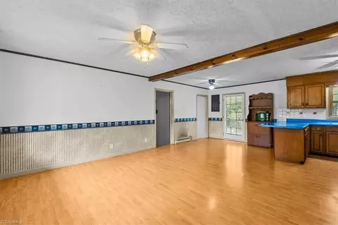 Living - 8203 Harrell Rd E, Oak Ridge, NC 27310 photo 6 of 9