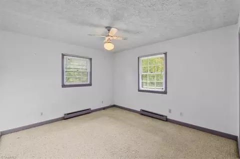 Bedroom - 8203 Harrell Rd E, Oak Ridge, NC 27310 photo 7 of 9