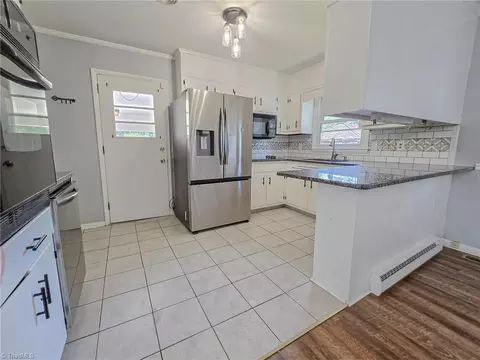 Kitchen - 506 Archergate Rd, Browns Summit, NC 27214 photo 2 of 2