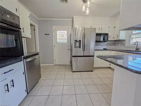 Kitchen - 506 Archergate Rd, Browns Summit, NC 27214 photo 1 of 2