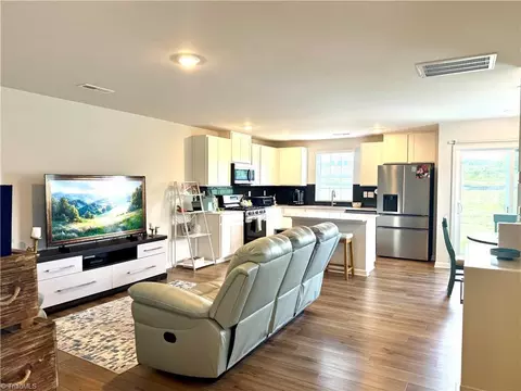 Living - 227 Plumtree Ct, King, NC 27021 photo 1 of 2