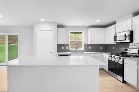 Kitchen - 118 Primrose St, King, NC 27021 photo 2 of 2