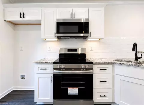 Kitchen - 112 Taft St, Mayodan, NC 27027 photo 2 of 3
