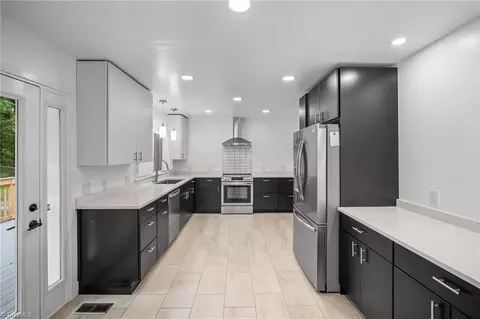 Kitchen - 601 Quaker Ln, High Point, NC 27262 photo 2 of 2