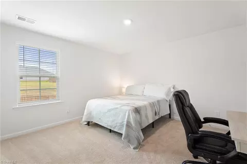 Bedroom - 162 E Farm Loop, Stokesdale, NC 27357 photo 3 of 4