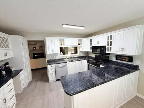 Kitchen - 313 Quarterpath Ln, Jamestown, NC 27282 photo 3 of 4