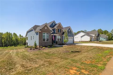 Exterior - 7789 Chadding Dr, Oak Ridge, NC 27310 photo 4 of 10