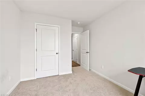 Bedroom - 133 E Farm Loop, Stokesdale, NC 27357 photo 5 of 7