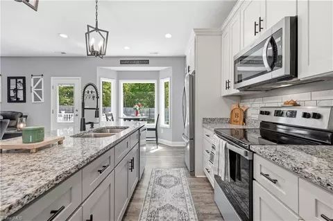 Kitchen - 106 N Old Nc Highway 75, Stem, NC 27581 photo 3 of 4