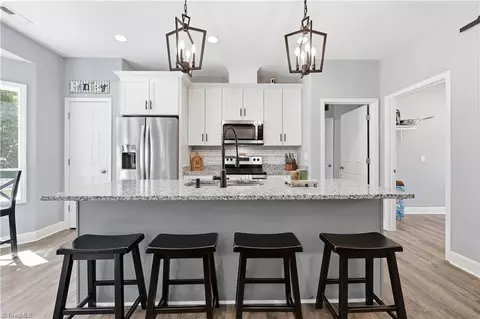 Kitchen - 106 N Old Nc Highway 75, Stem, NC 27581 photo 2 of 4