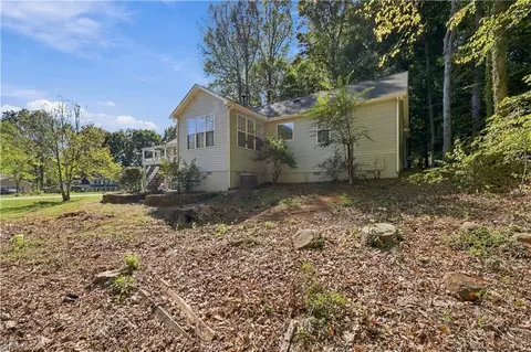 Exterior - 7500 Bartonshire Ct, Oak Ridge, NC 27310 photo 9 of 11