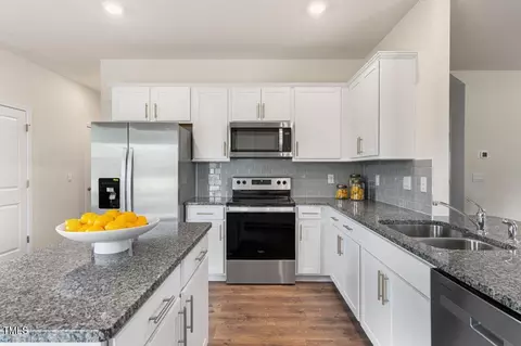 Kitchen - 444 Shorthorn Dr, Wake Forest, NC 27587 photo 5 of 7