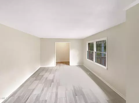Living - 5817 Tomahawk Trl, Durham, NC 27712 photo 4 of 4
