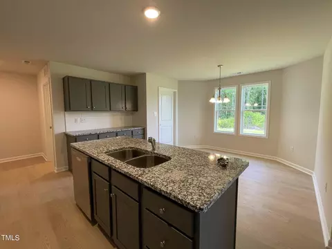 Kitchen - 102 Bushel Ln, Willow Spring, NC 27592 photo 3 of 4