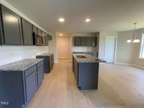 Kitchen - 102 Bushel Ln, Willow Spring, NC 27592 photo 2 of 4