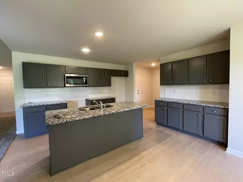 Kitchen - 102 Bushel Ln, Willow Spring, NC 27592 photo 1 of 4