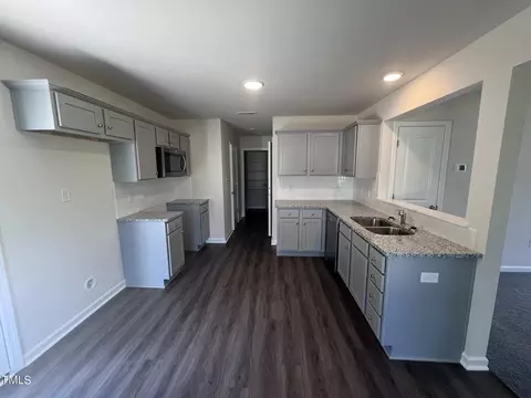 Kitchen - 138 Bushel Ln, Willow Spring, NC 27592 photo 2 of 3