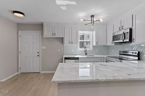 Kitchen - 385 E Williams St, Angier, NC 27501 photo 6 of 8