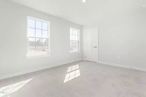 Bedroom - 513 Freedom Trail Dr, Willow Spring, NC 27592 photo 2 of 3