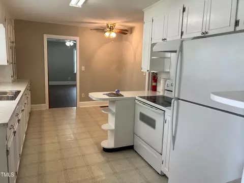 Kitchen - 1004 E Main St, Benson, NC 27504 photo 1 of 2