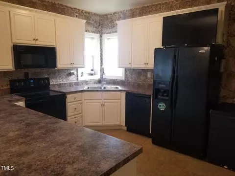 Kitchen - 1805 Lipscomb Rd E, Wilson, NC 27893 photo 2 of 2