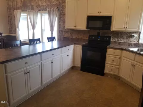 Kitchen - 1805 Lipscomb Rd E, Wilson, NC 27893 photo 1 of 2