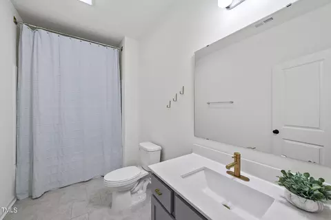 Bath - 126 Courrone Ct, Willow Spring, NC 27592 photo 2 of 3