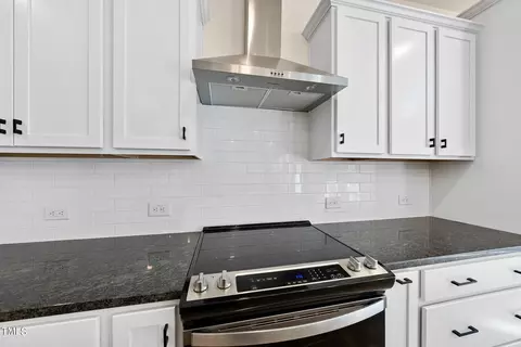 Kitchen - 126 Courrone Ct, Willow Spring, NC 27592 photo 6 of 7