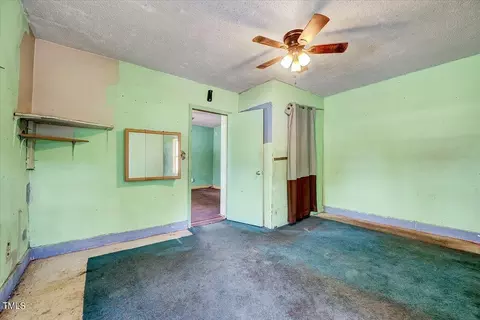 Bedroom - 304 W Main St, Pine Level, NC 27568 photo 2 of 11