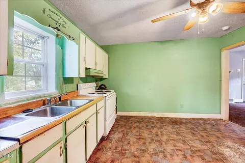Kitchen - 304 W Main St, Pine Level, NC 27568 photo 3 of 4