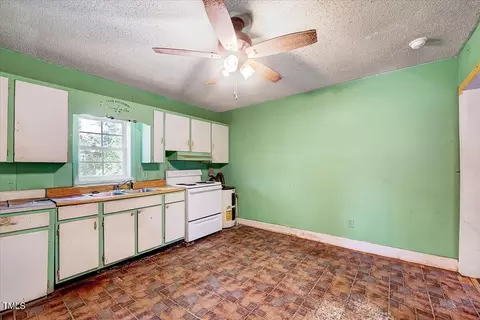 Kitchen - 304 W Main St, Pine Level, NC 27568 photo 2 of 4