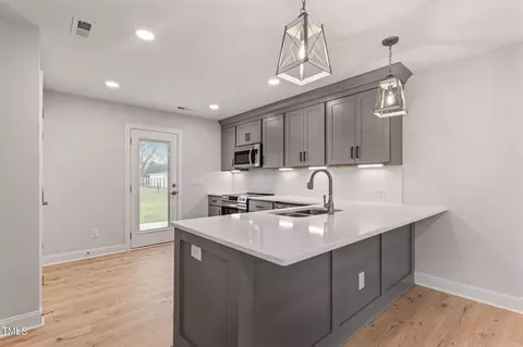 Kitchen - 306 E Godwin St, Dunn, NC 28334 photo 1 of 3