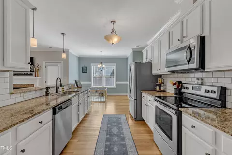 Kitchen - 222 Windy Dr, Willow Spring, NC 27592 photo 3 of 3