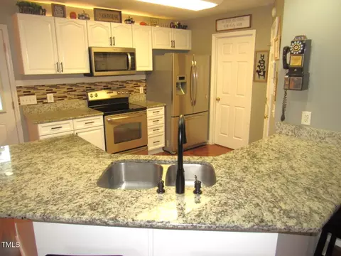 Kitchen - 3214 Tump Wilkins Rd, Stem, NC 27581 photo 3 of 9